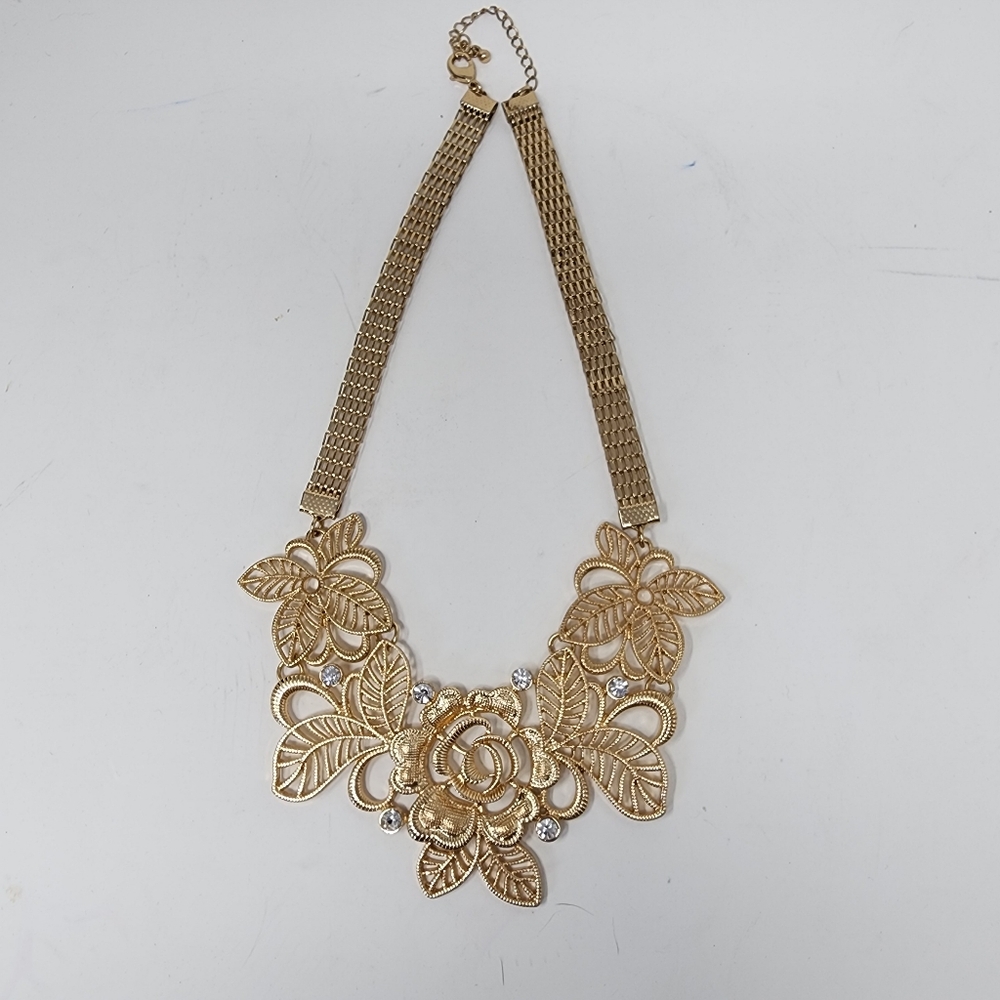 Floral goldtone rhinestone statement necklace